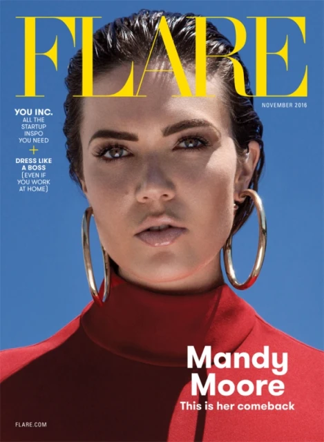 Magazine cover featuring Mandy Moore wearing red, large hoop earrings, against a blue background, promoting startup tips and a boss-like look.
