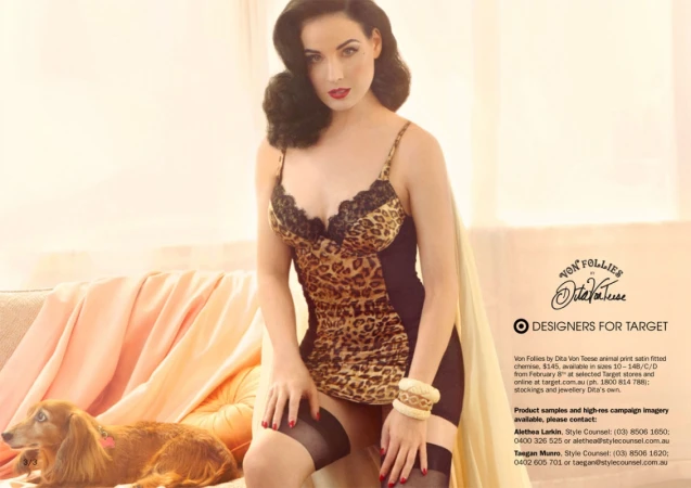 Dita Von Teese in a leopard-print chemise poses with a dachshund, part of a Von Follies for Target advertisement campaign.