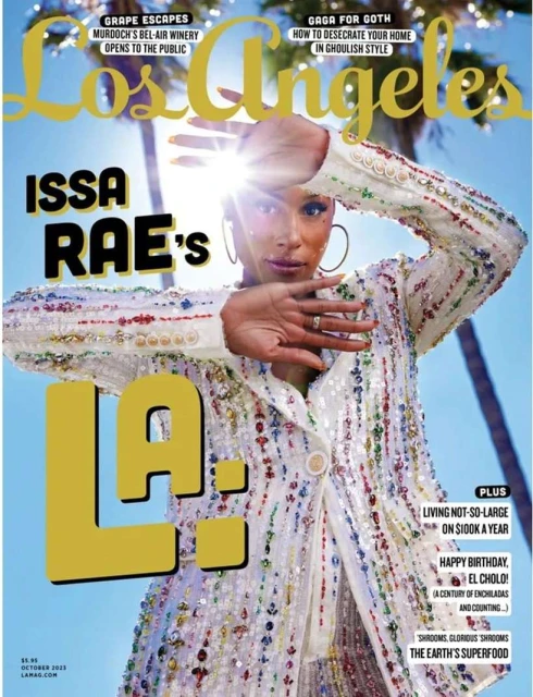 Issa Rae cover of Los Angeles magazine featuring the actress in a sequined jacket against a blue sky with palm trees.