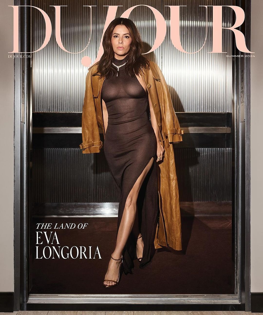 Eva Longoria graces the cover of Dujour Magazine Summer 2024, posing in a brown dress and trench coat, set against a metal backdrop.