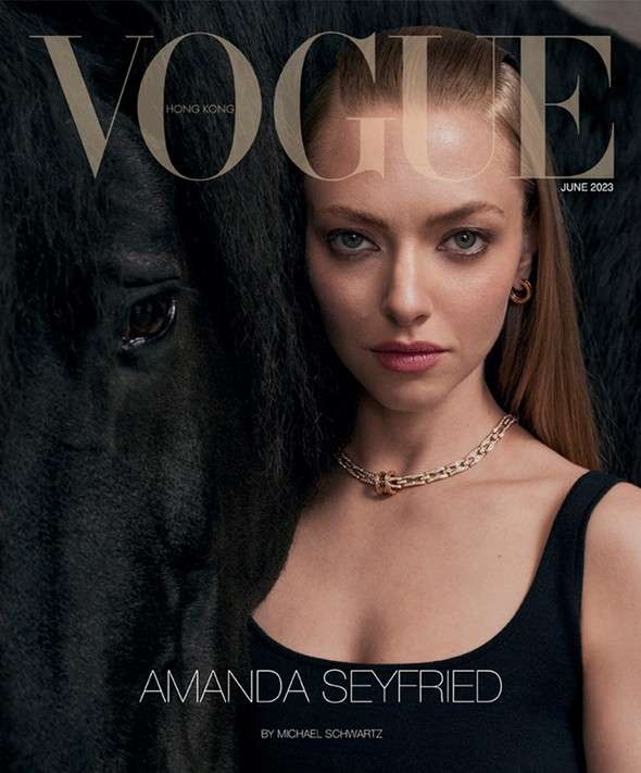 Vogue Hong Kong cover featuring Amanda Seyfried with a black horse, wearing a black top and gold jewelry. June 2023 issue.