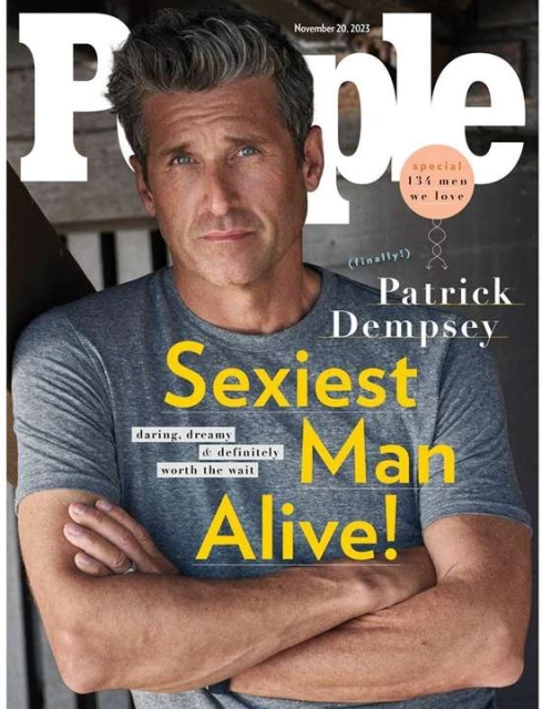 People Magazine cover featuring Patrick Dempsey, named 'Sexiest Man Alive!' Grey t-shirt and arms crossed, against a blurred background.