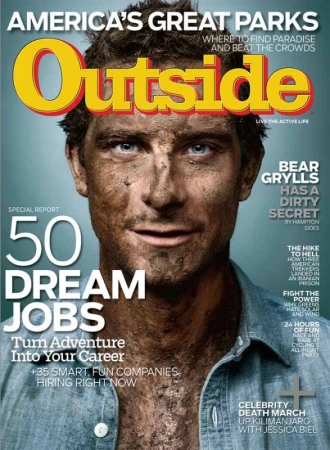 Magazine cover featuring Bear Grylls with a dirty face, promoting adventure and outdoor living. The cover is for Outside magazine.
