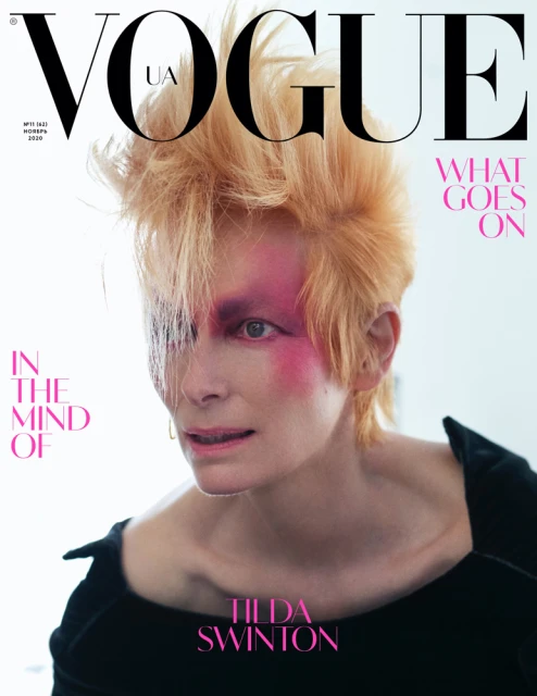 Vogue UA cover featuring Tilda Swinton with short blonde hair and pink makeup, in a close-up portrait with a white background.