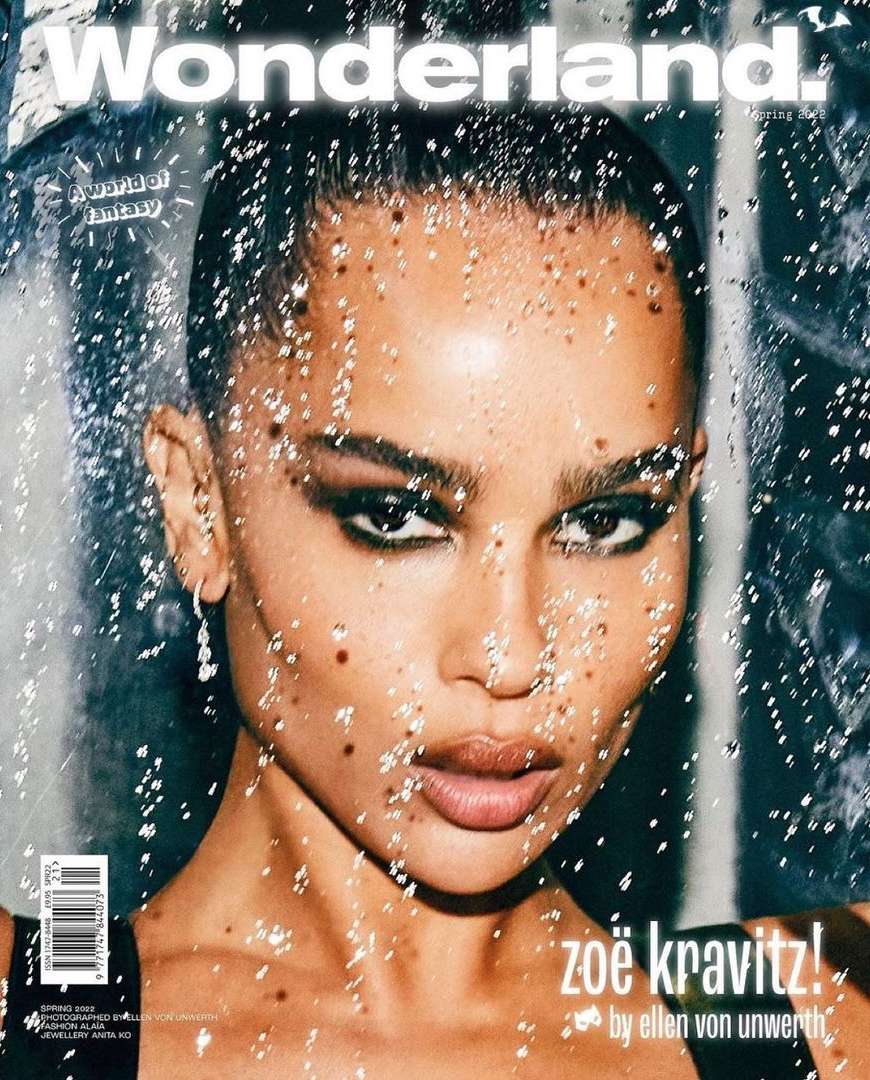 Magazine cover featuring a portrait of Zoë Kravitz with glitter makeup, shot close-up with a shallow depth of field and cool color grading.