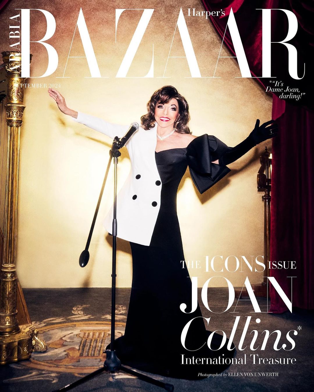 Joan Collins poses on a magazine cover wearing a black and white gown next to a microphone. Bazaar's The Icons Issue.