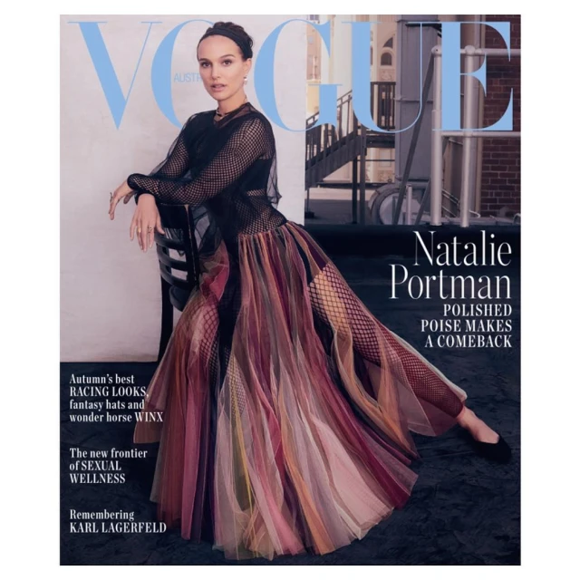 Vogue Australia magazine cover featuring Natalie Portman in black mesh top and multicolored skirt against a rooftop backdrop.