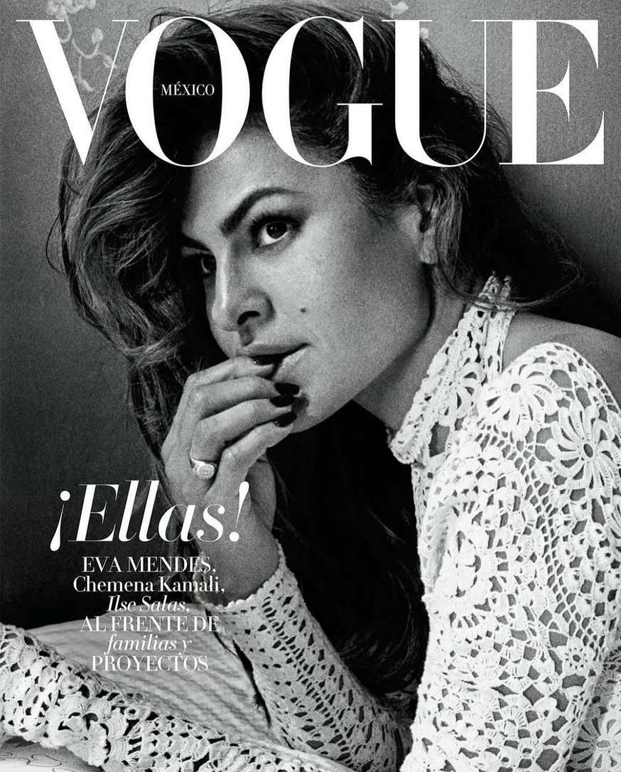 Vogue Mexico cover featuring Eva Mendes in a monochrome portrait. She's wearing a white lace top with a floral background and black manicure.