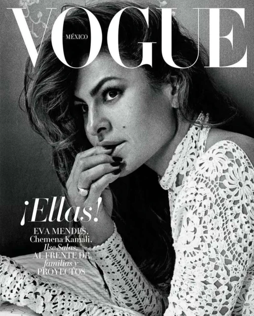 Vogue Mexico cover featuring Eva Mendes in a monochrome portrait. She's wearing a white lace top with a floral background and black manicure.