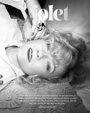 Black and white portrait of Kirsten Dunst lying down, with text overlay and focus on her face and an ornate ring.