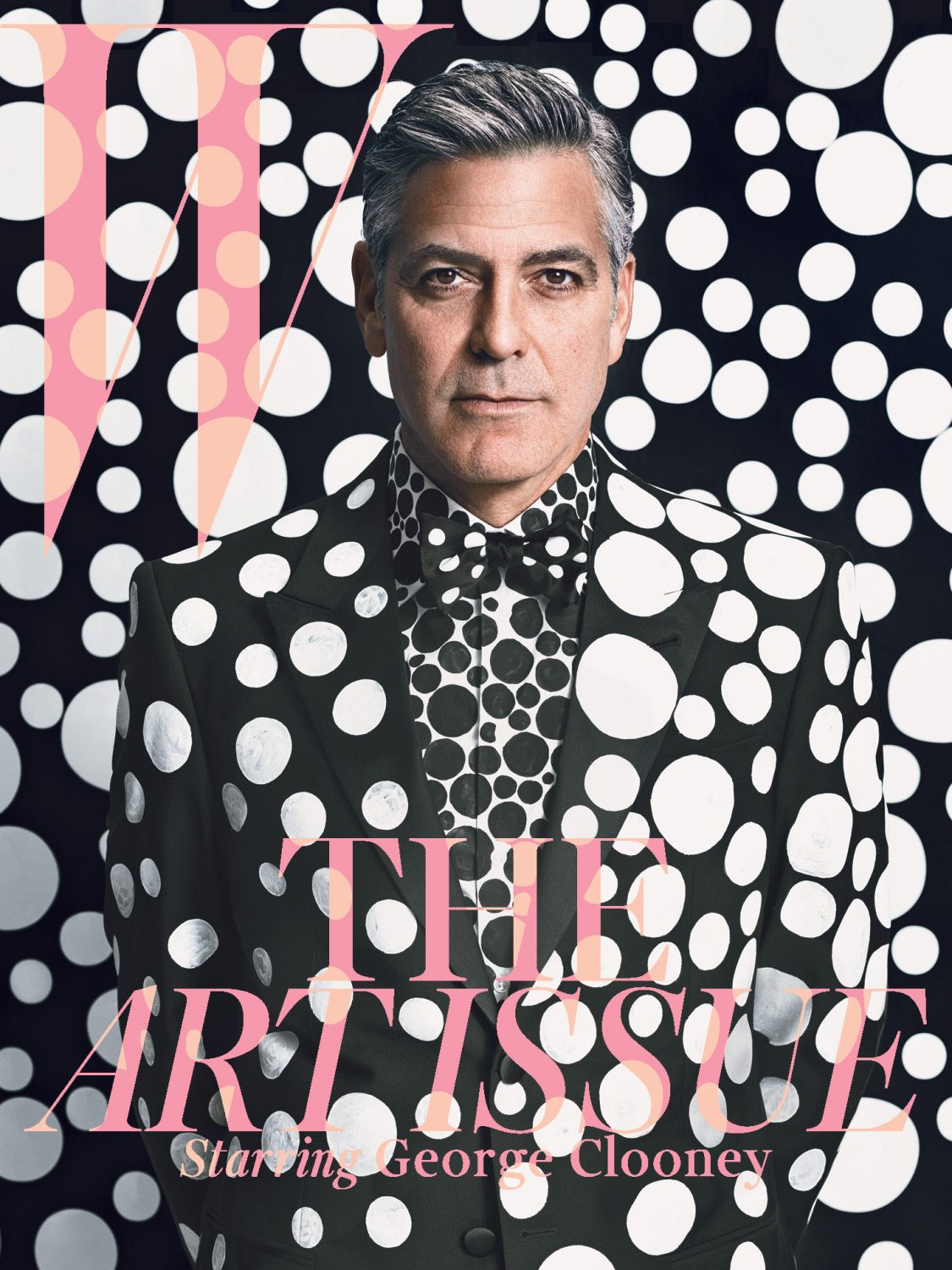 George Clooney wears polka dot suit on a magazine cover. Text reads 'The Artiste, Starring George Clooney' against spotted backdrop.