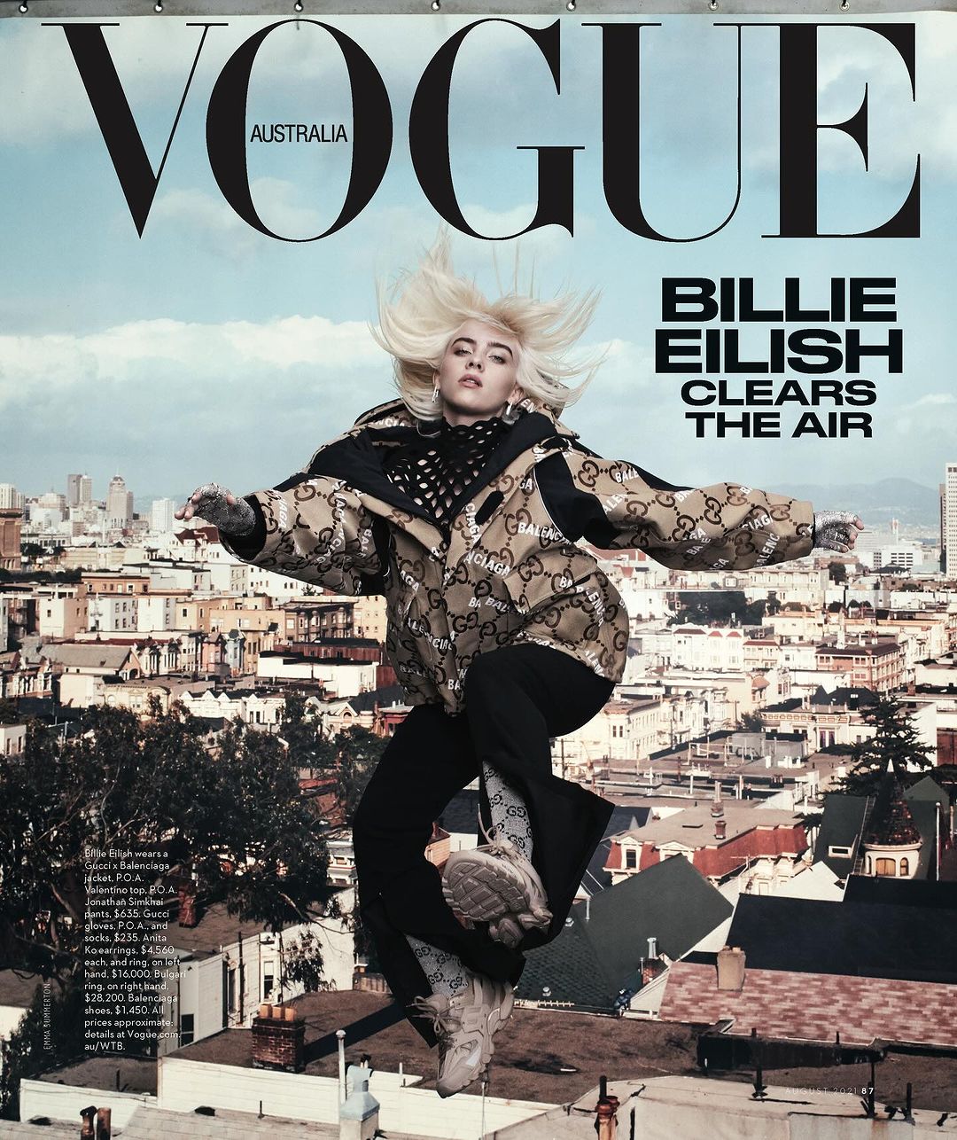 Vogue Australia cover featuring Billie Eilish in patterned jacket against San Francisco cityscape, vibrant and modern fashion editorial.