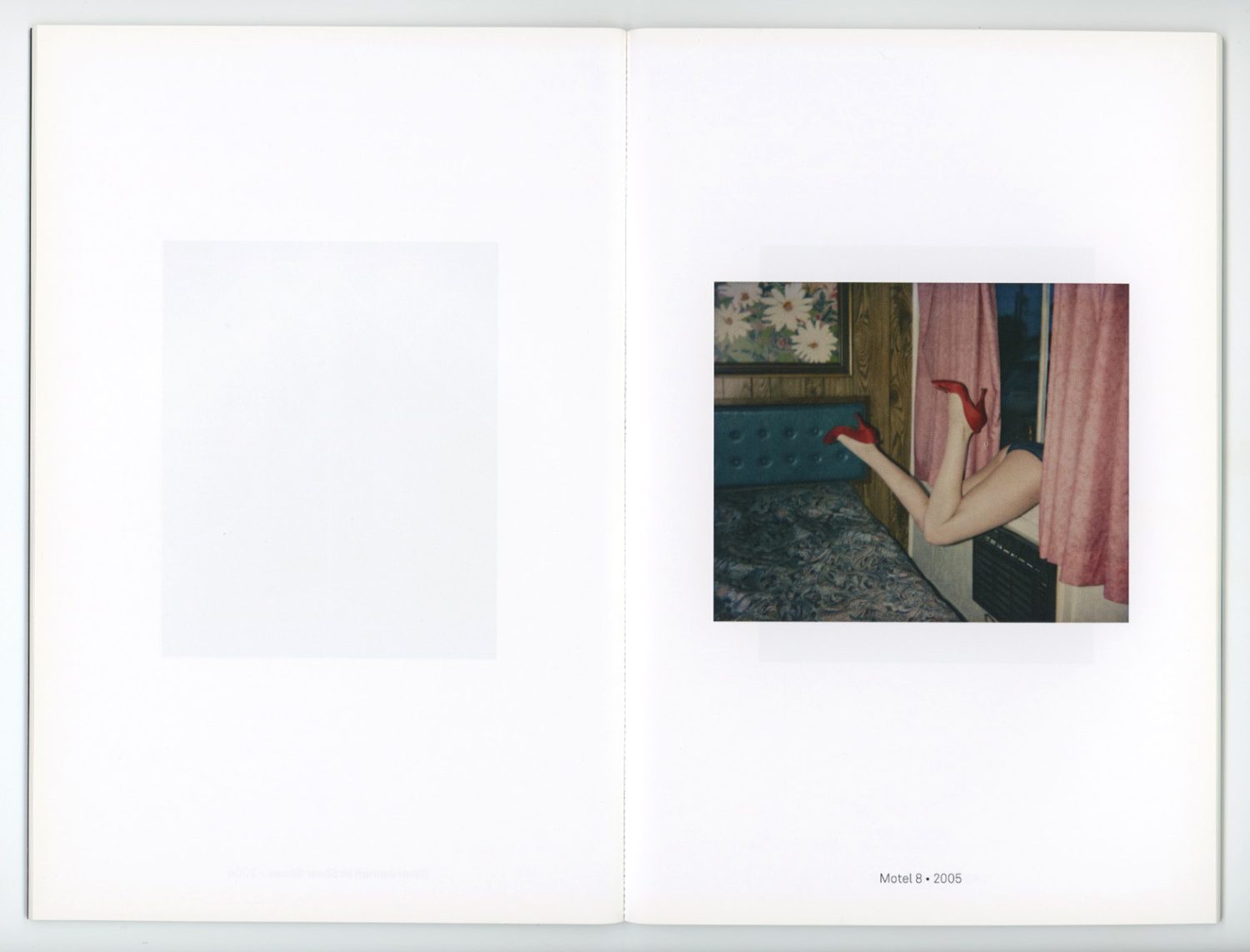 Open book page with photo of woman's legs in red high heels emerging from behind pink curtains into a hotel room with floral wallpaper.