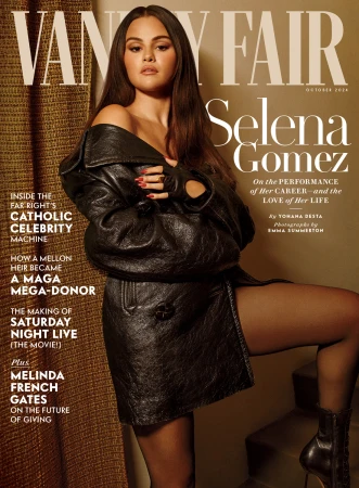 Selena Gomez on Vanity Fair cover, October 2024 issue. She poses in a black leather jacket, black tights and heels. Golden-tone background.