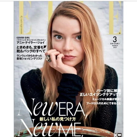 Elle magazine cover featuring Anya Taylor-Joy, blonde hair, wearing dark sweater, against a backdrop of magazine text and logo.