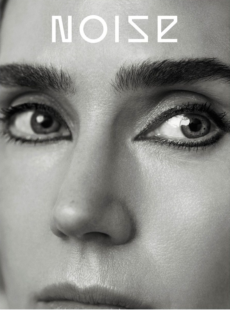 Monochromatic close-up of a woman's face featuring her eyes, nose, and mouth, with the word 'Noise' displayed above her forehead.