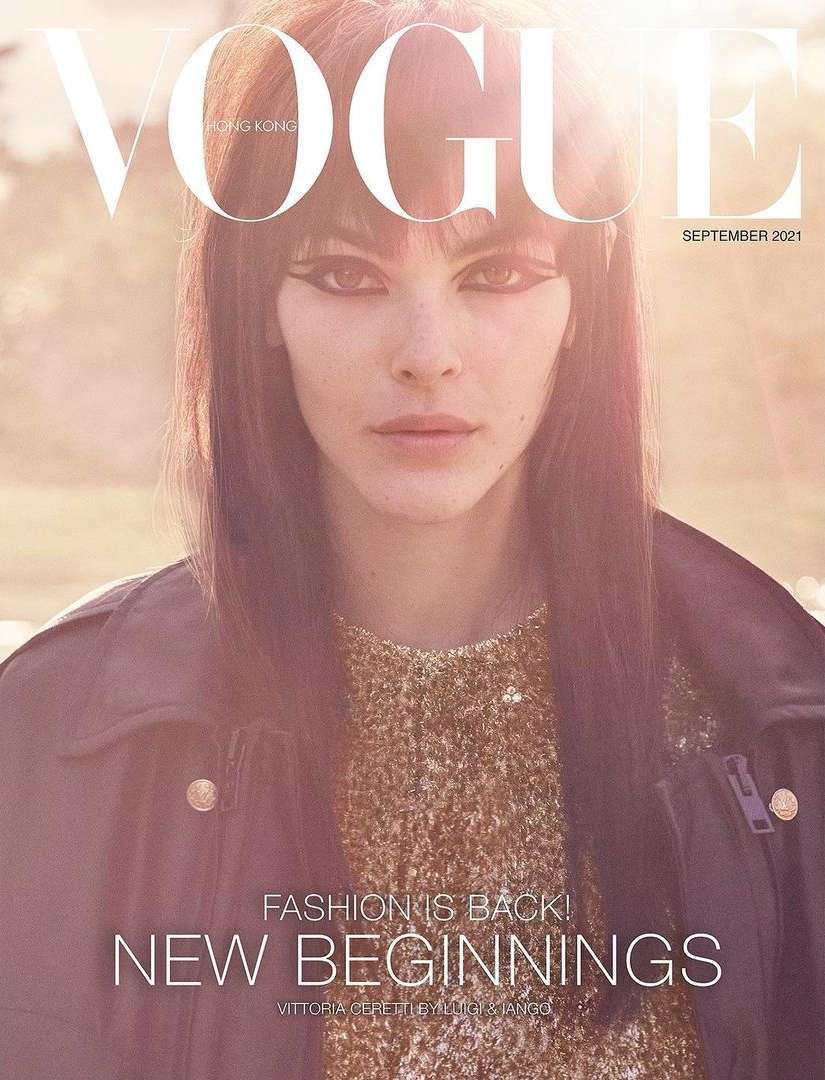 Vogue Hong Kong September 2021 cover featuring a woman with dark hair, wearing a black jacket and a golden sequined shirt.