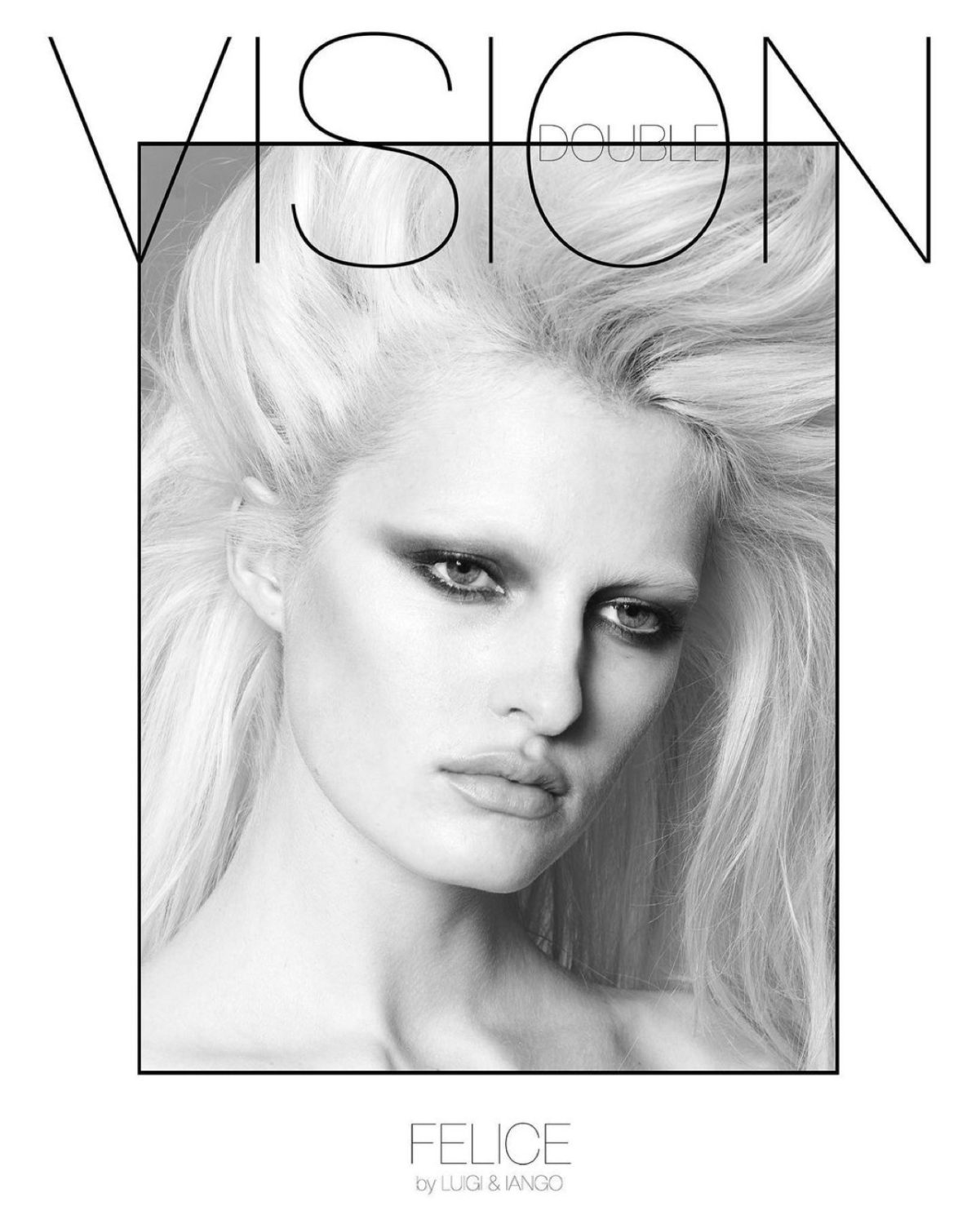 Black and white portrait of a female fashion model with light blonde hair, dramatic eye makeup, and intense gaze, framed by bold typography.