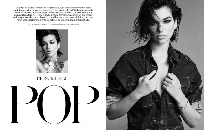 Dua Lipa in a black denim shirt with wet-look hair against a grey background in a black and white editorial magazine layout