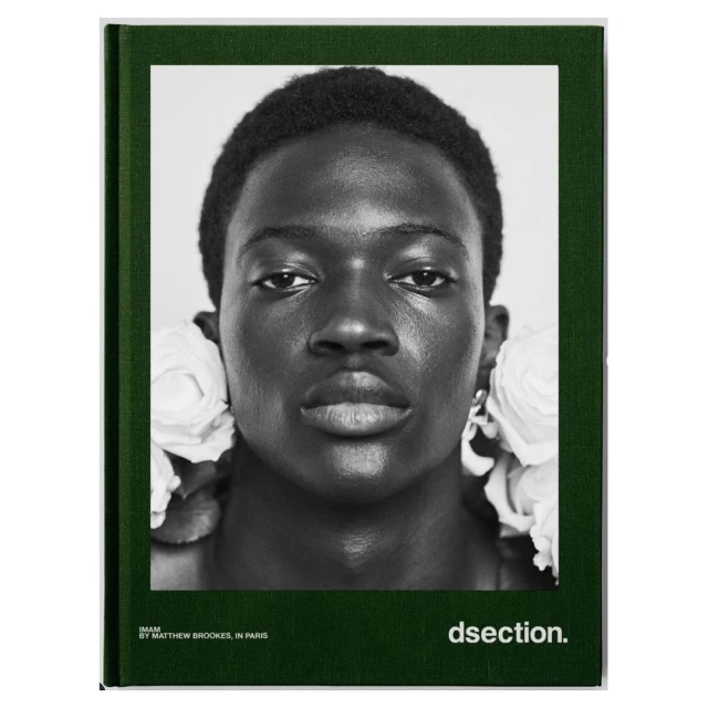 Book cover with close-up portrait of an African American person adorned with white flowers and featuring the text 'dsection'.