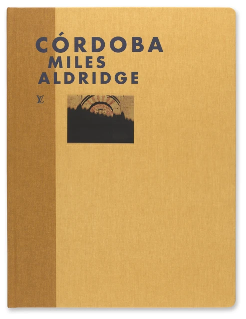 Tan book cover with the words 'Córdoba Miles Aldridge' and small image of an arched doorway.