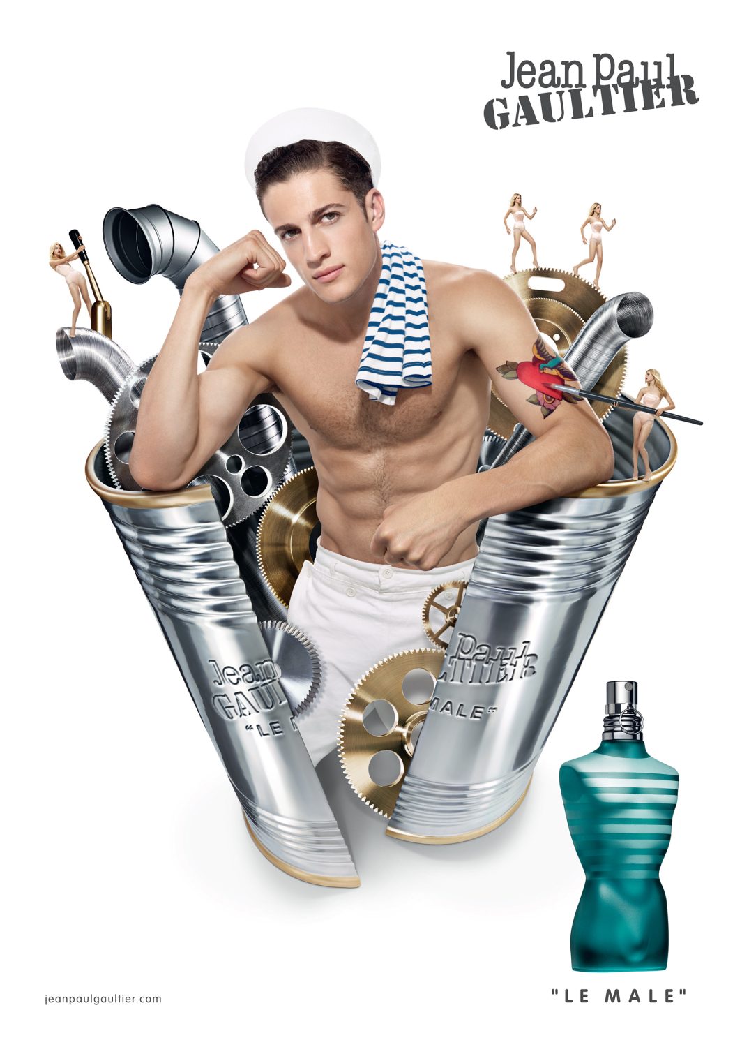 CGI image: shirtless male in sailor hat next to perfume bottle and mechanical gears, for Jean Paul Gaultier fragrance ad campaign.