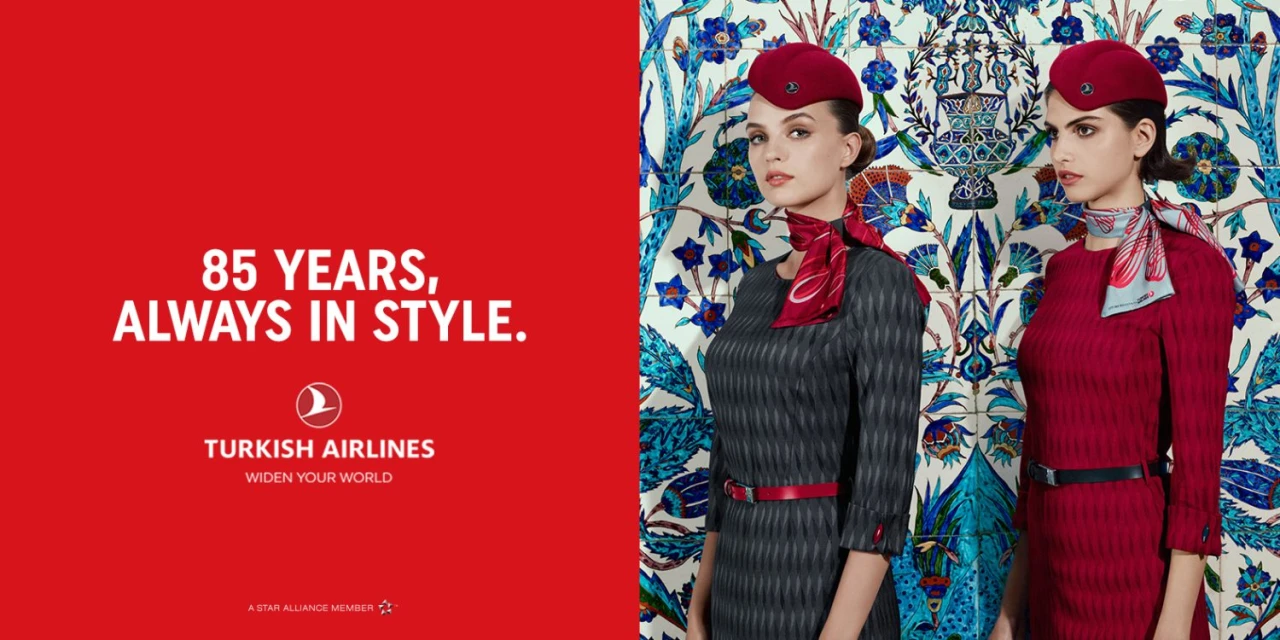 Two women in airline uniforms stand against a patterned tile backdrop for Turkish Airlines, with red promotional text on the left.