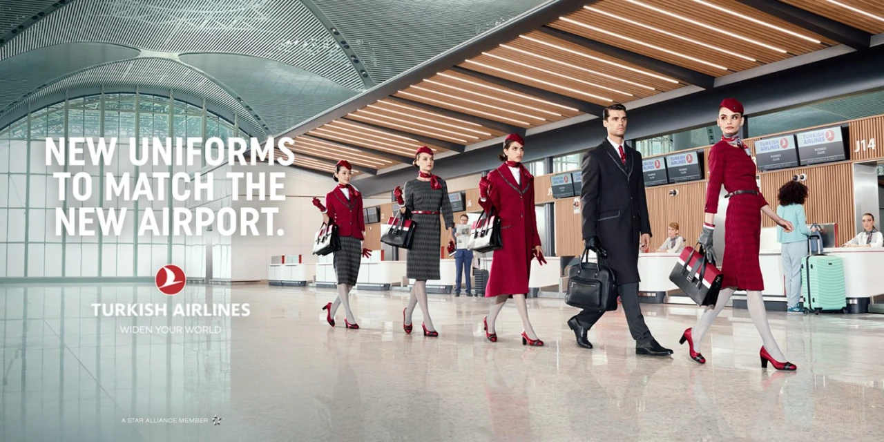 Turkish Airlines ad featuring airline staff in new uniforms walking through an airport terminal with modern architecture and lighting.