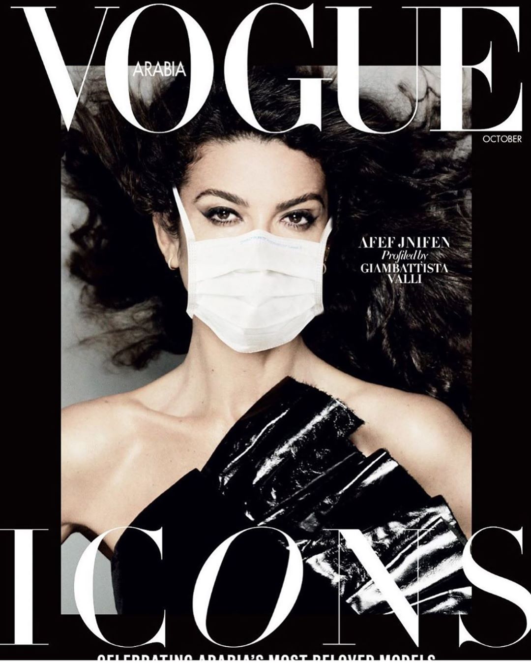 Vogue Arabia cover featuring Afef Jnifen wearing a face mask and black dress, set against a monochrome background, October issue.