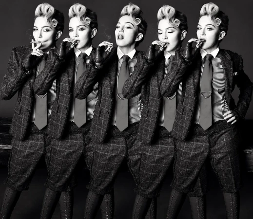 Black and white fashion shot of five instances of the same adult woman smoking a cigarette in a plaid suit with a tie and dress shoes.