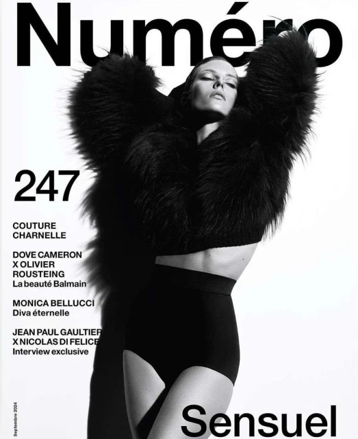 Numero magazine cover featuring a woman in a dark, fur-like coat and black bottoms against a white background with magazine text.