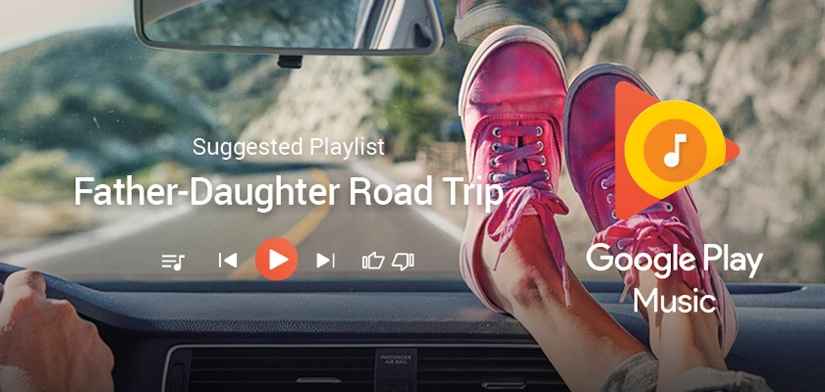 Close-up from inside car looking out; woman's feet in pink sneakers are on dashboard, blurry mountains and road are visible.