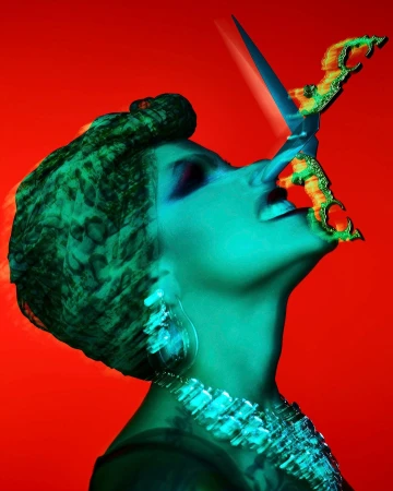 Profile of a woman with teal lighting and a patterned headwrap holding a decorative sword near her mouth against a solid red background.