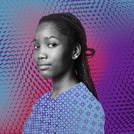 Monochrome portrait of a young Black woman with braided hair wearing a patterned blue top against a textured purple background.