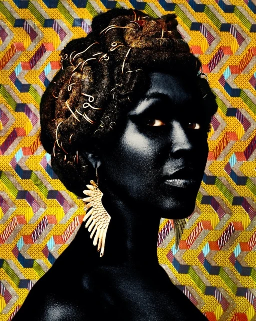Portrait of a Black woman with an intricate hairstyle and artistic gold earrings, set against a vibrant, patterned background.