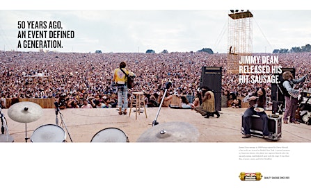 Large outdoor concert with a rock band performing on stage for a massive crowd in a vintage aesthetic, plus text ad for Jimmy Dean sausage.