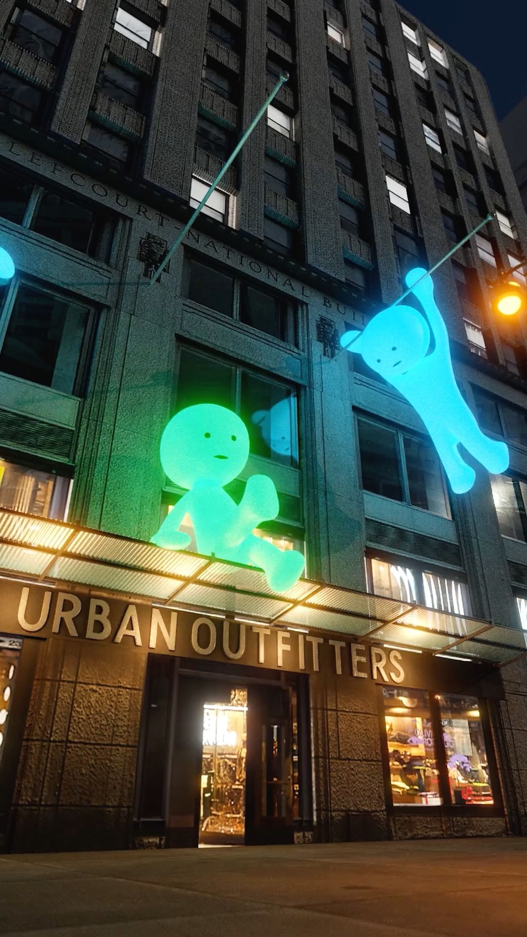 Exterior shot of the Urban Outfitters store, featuring animated figures on the facade, enhancing its urban setting at night.