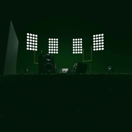Stage setup with speakers and lighting arrays. The scene is dark, set in a minimalist style with a green color cast.