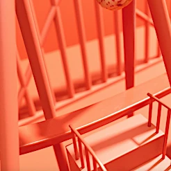 Abstract architectural design with orange structural elements, stairs, and geometric patterns. Modern and minimalist building concept.