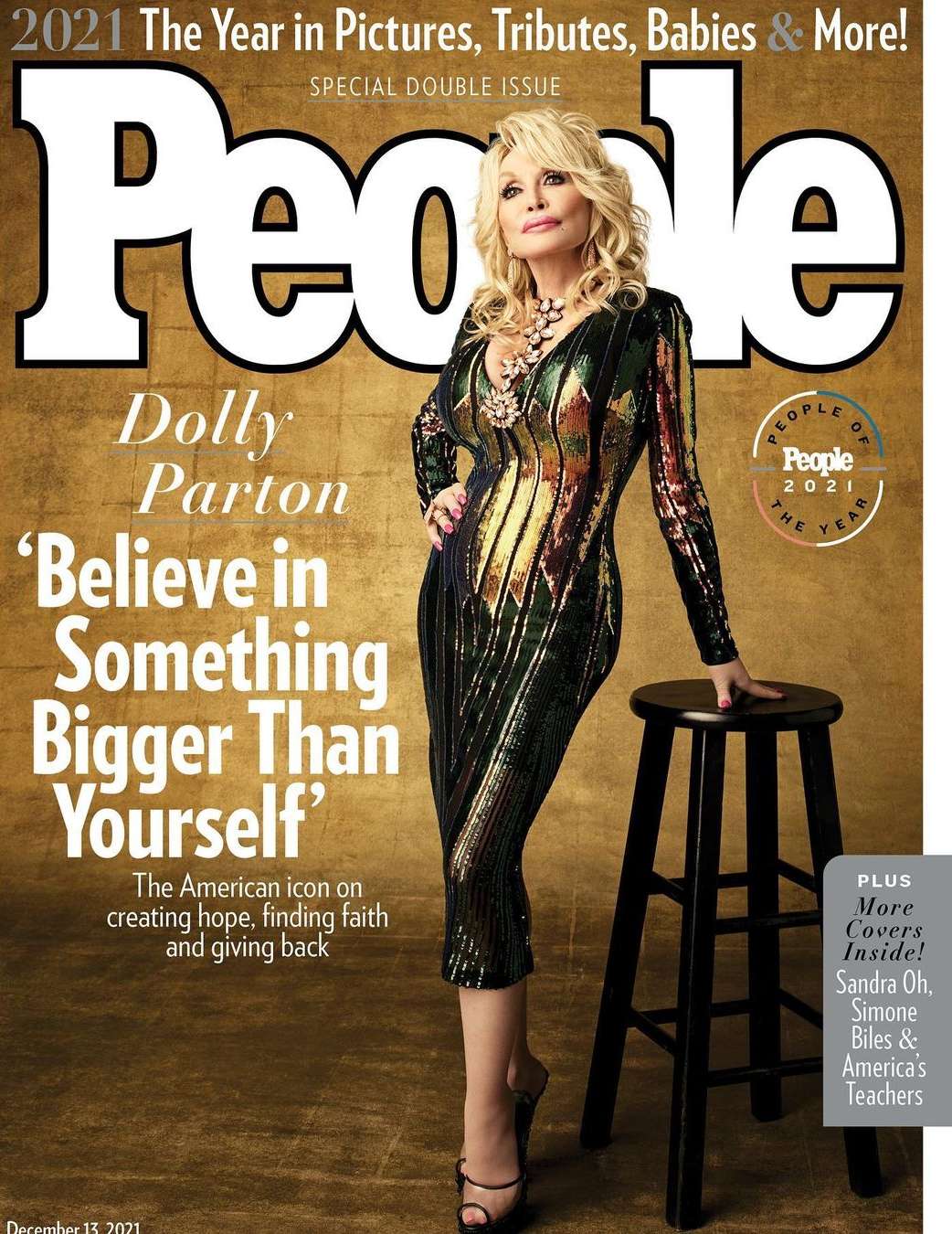 Magazine cover featuring Dolly Parton in a sequined dress, posing next to a black stool against a textured gold background.