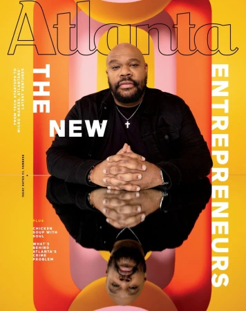 Magazine cover featuring an African-American man in a dark jacket, mirrored reflection, and 'Atlanta' title against a yellow and pink backdrop.
