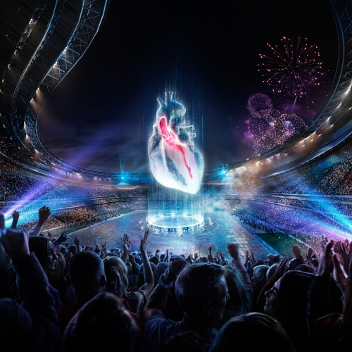 Hologram of a heart in a stadium with a crowd, fireworks, and blue stage lighting creates a futuristic medical visual.