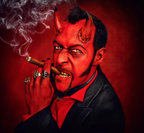 Man with red face and horns in a suit smoking a cigar against a red background, creating a striking portrait with a devilish theme.