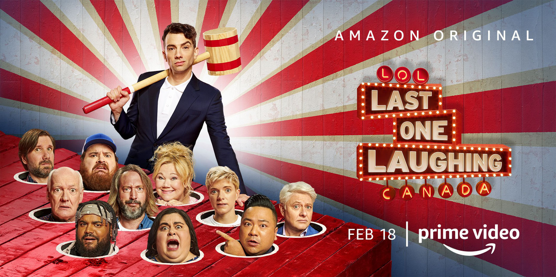 Promotional image for Last One Laughing Canada featuring host Mae Martin and contestants in a red-and-white setting with a wooden hammer.
