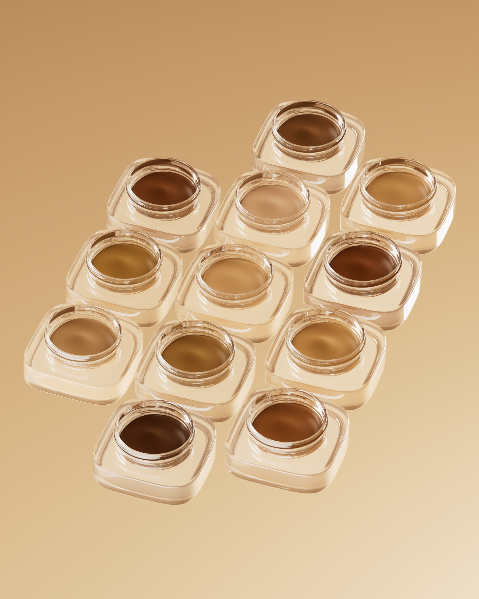 Assortment of foundation makeup in clear, square containers with a gradient of skin tones, set against a neutral background.