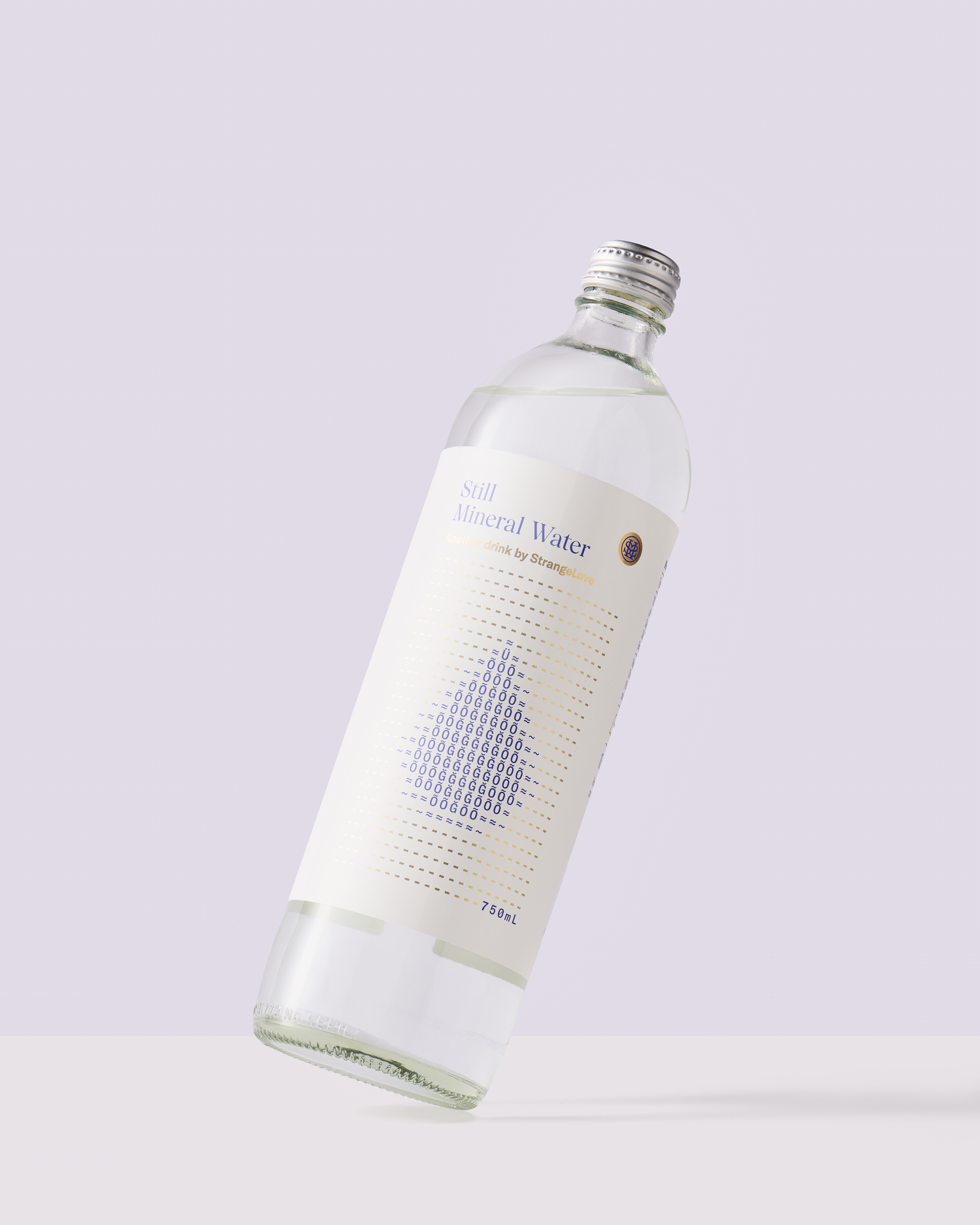 Studio shot of a transparent bottle of mineral water with a minimalist label featuring geometric patterns against a white background.