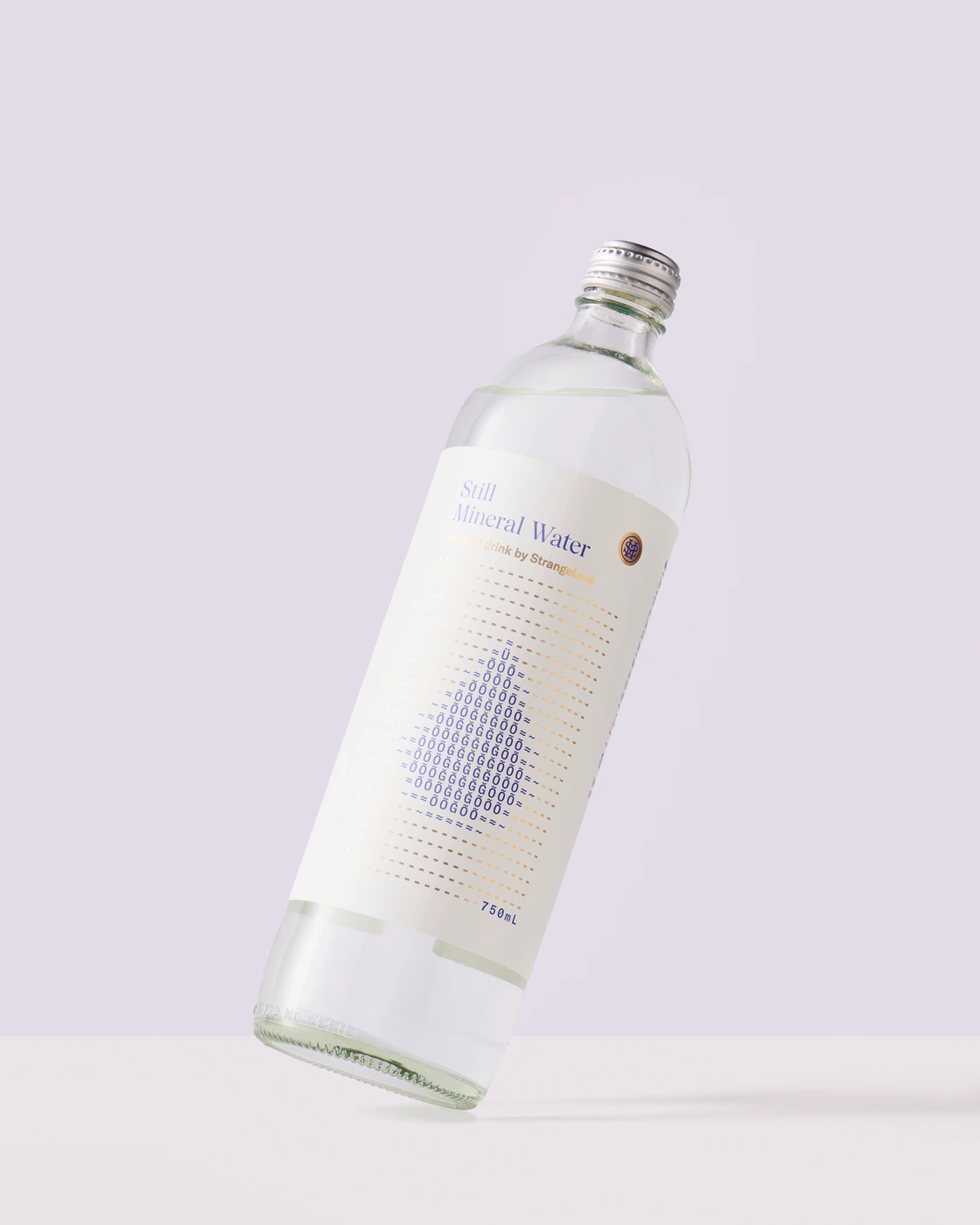 Clear glass bottle of Still Mineral Water tilted at an angle against a minimal pale pastel studio background.
