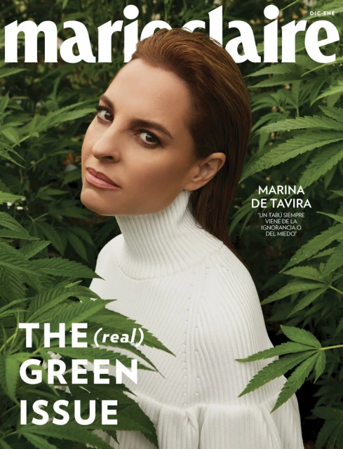 Magazine cover featuring a woman with auburn hair in a white turtleneck, posing against a background of green cannabis leaves.