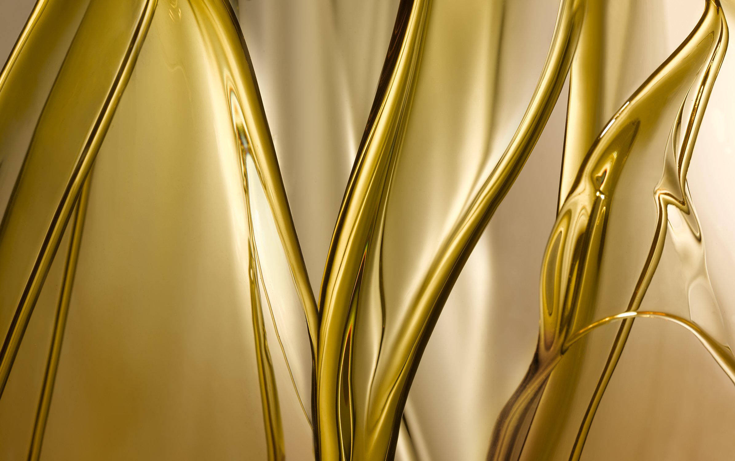 Abstract close-up of viscous, golden liquid in motion forming curved shapes against a blurred background, perfect for food visuals.