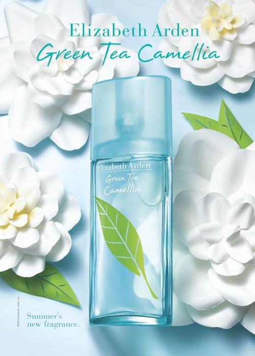 Elizabeth Arden Green Tea Camellia perfume bottle centered with white flowers and green leaves against a light blue background.